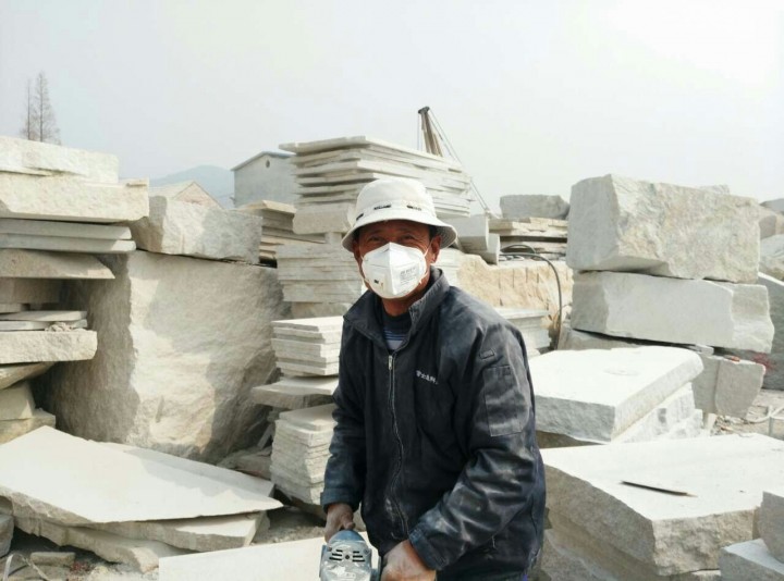 An employee keeping safe with a protective mask…